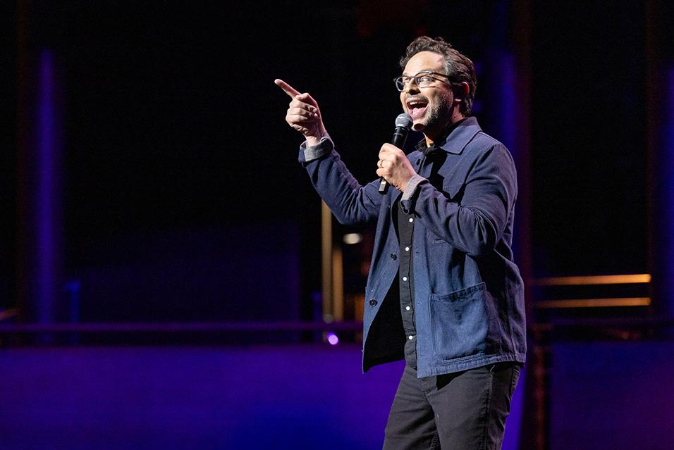 Nick Kroll performing onstage at Comedy vs Cancer 2024 